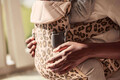 Nosidełko dla dziecka ONE Beż Leopard BabyBjorn